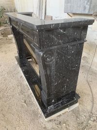 Chimenea m&aacute;rmol negro marquina pulido 03